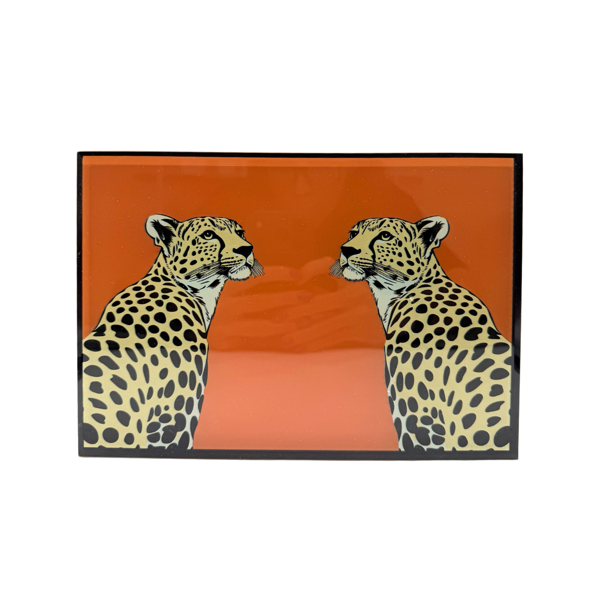Detalhe da estampa de onças da caixa decorativa Leopardos em vidro laranja - Il Nido